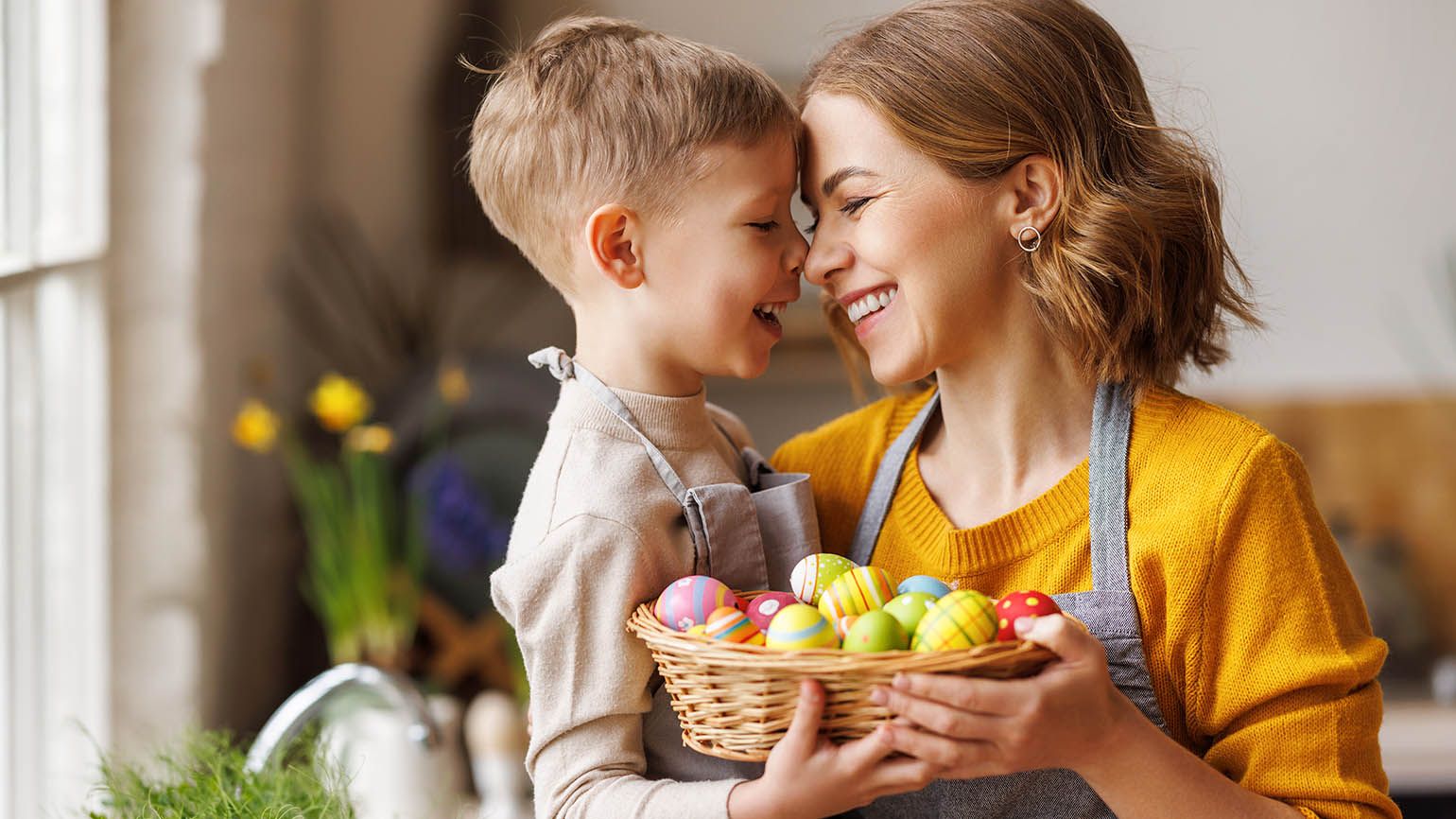 Mother-and-son-hold-Easter-eggs-in-a-basket-for-their-acts-of-kindness.jpg.optimal